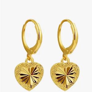 Fashion Love Earring 14 k Gold . Gold heart hoop earring 
Never wear it
